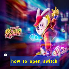 how to open switch oled game card slot